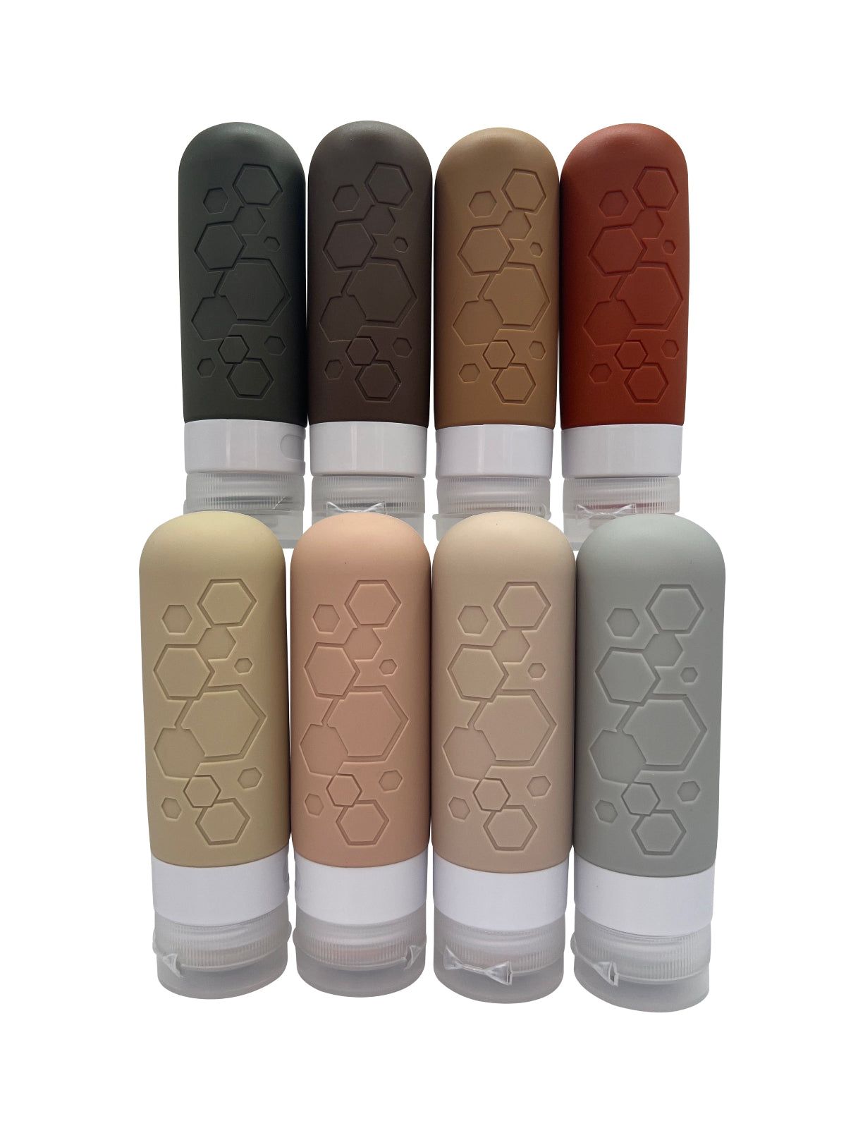 Set of eight silicone travel bottles with hexagonal pattern on a white background